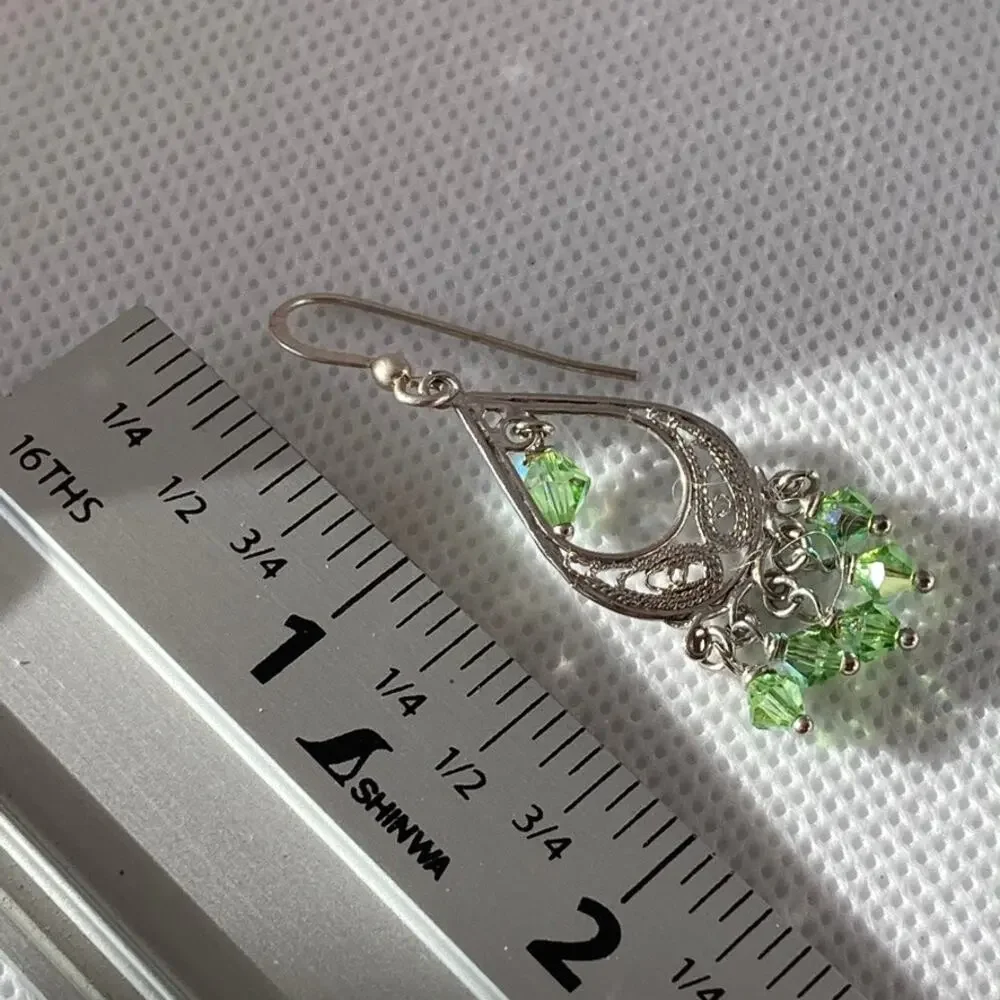 Delicate silver tone and leaf green chandelier earrings